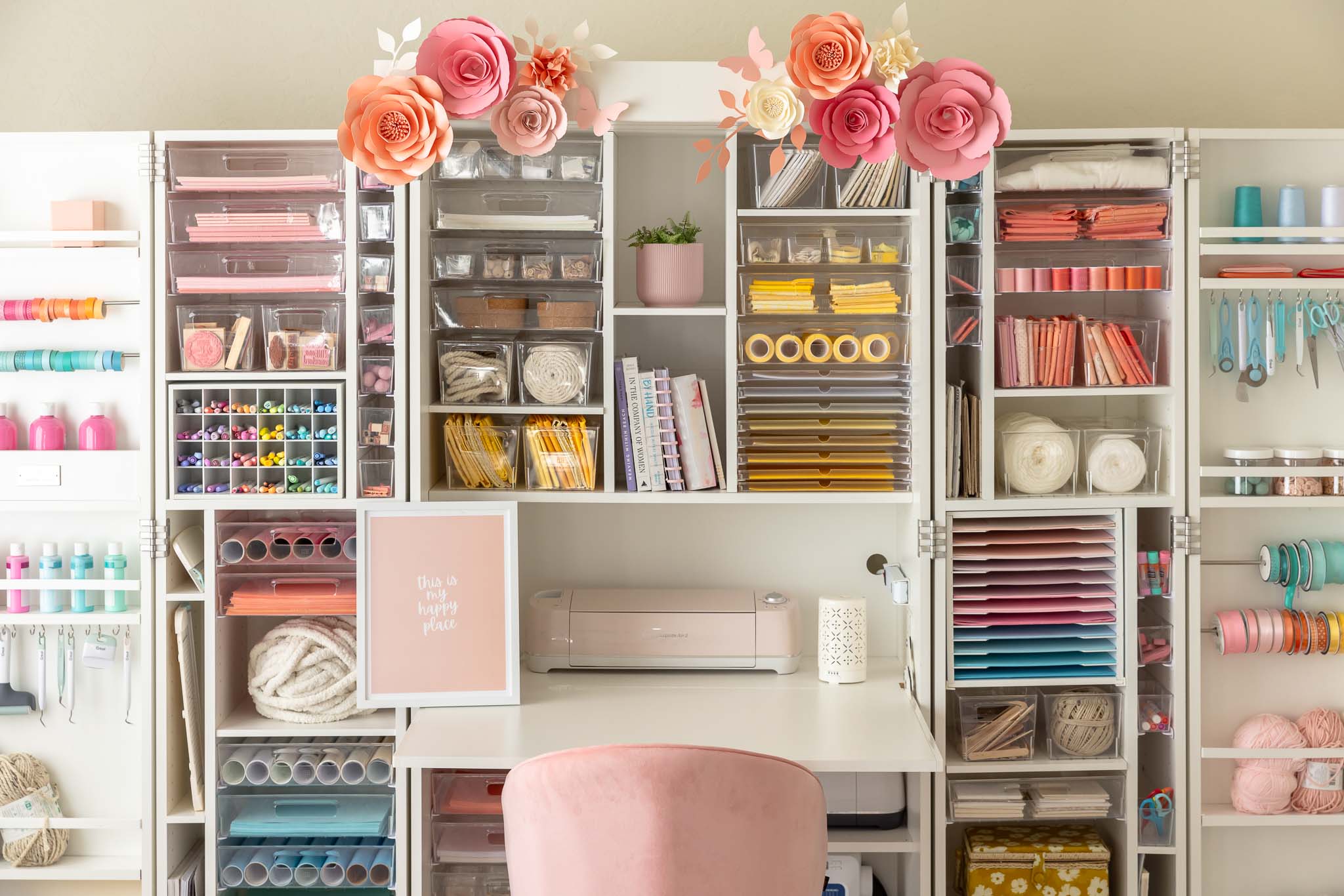 Organized craft supplies in a white storage cabinet called the DreamBox by Create Room.